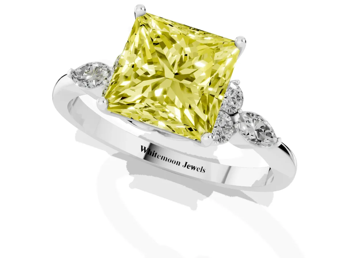 Fancy Yellow Princess Cut Brilliant Diamond Solitaire Ring with Pear Side Stones and Four-Prong Setting Silver