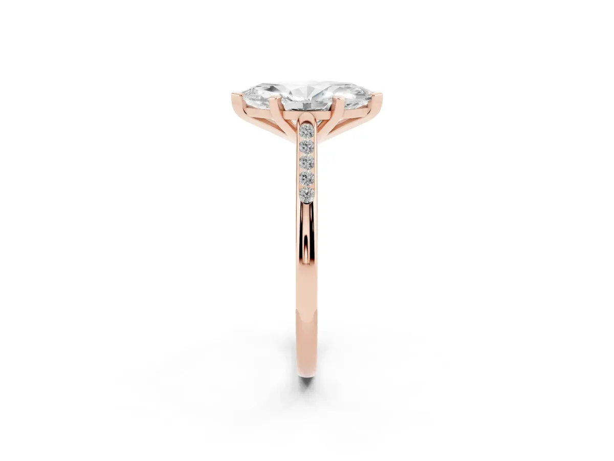 Marquise Cut Diamond Solitaire Ring with Channel Set Round Band and Prong Setting Rose gold