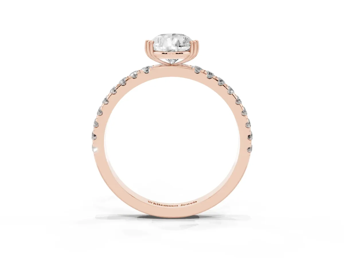 Pear Cut Brilliant Solitaire with Pavé Band and Claw Prong Setting Rose gold