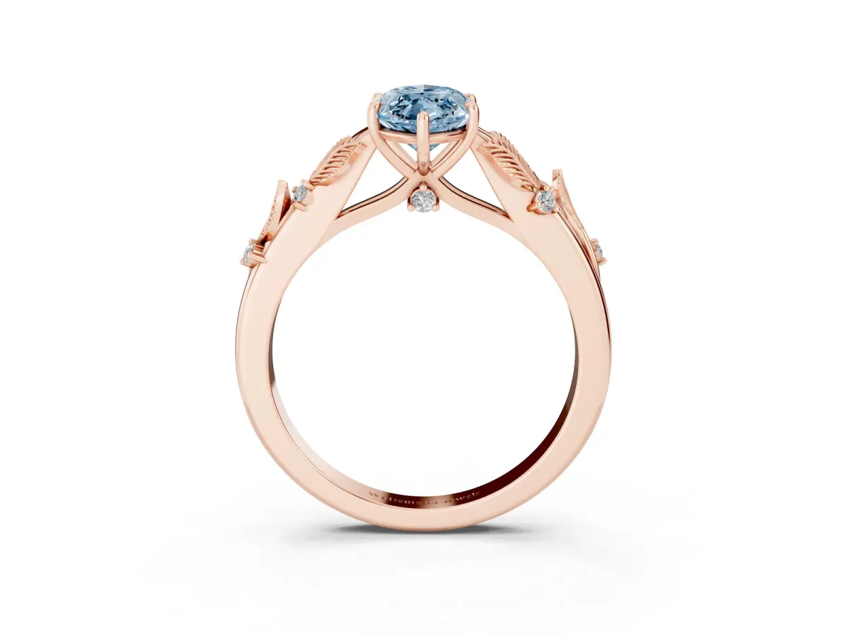 Fancy Blue Marquise Cut Diamond Solitaire Ring with Leaf Motif Band and Four-Prong Setting Rose gold