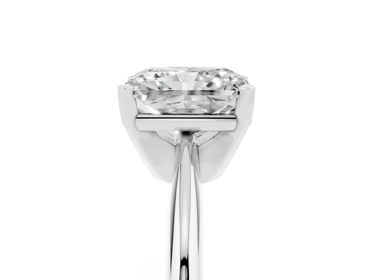 Radiant Cut Cut Solitaire Ring with Four-Prong Setting on a Classic Band Platinum