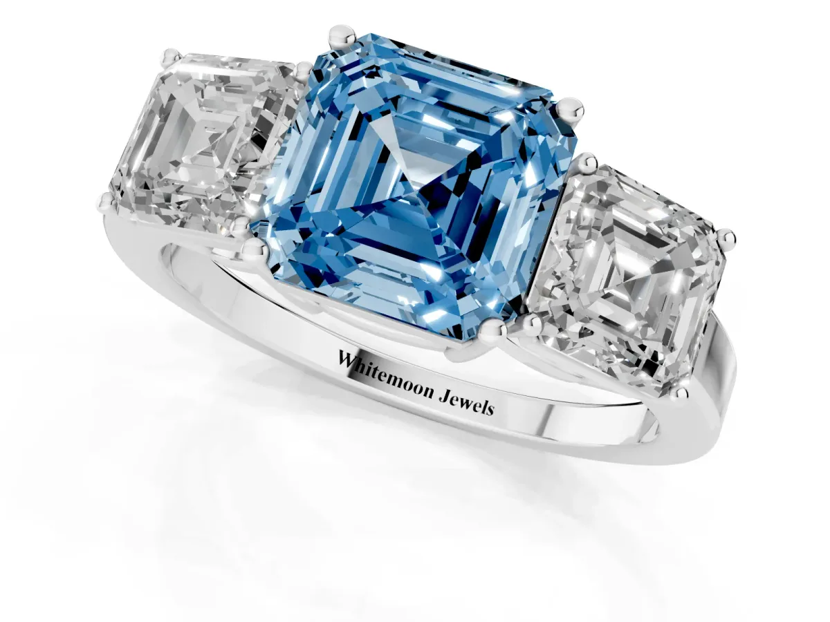 Fancy Blue Three-Stone Asscher Cut Cut Diamond Engagement Ring with Flat Band and Four-Prong Setting Silver