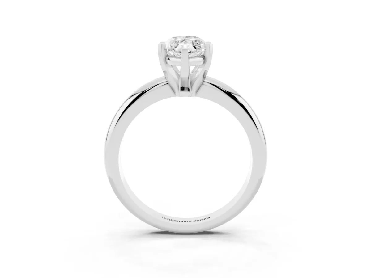 Marquise Cut Diamond Solitaire Engagement Ring with Round Band and Four-Prong Setting Platinum