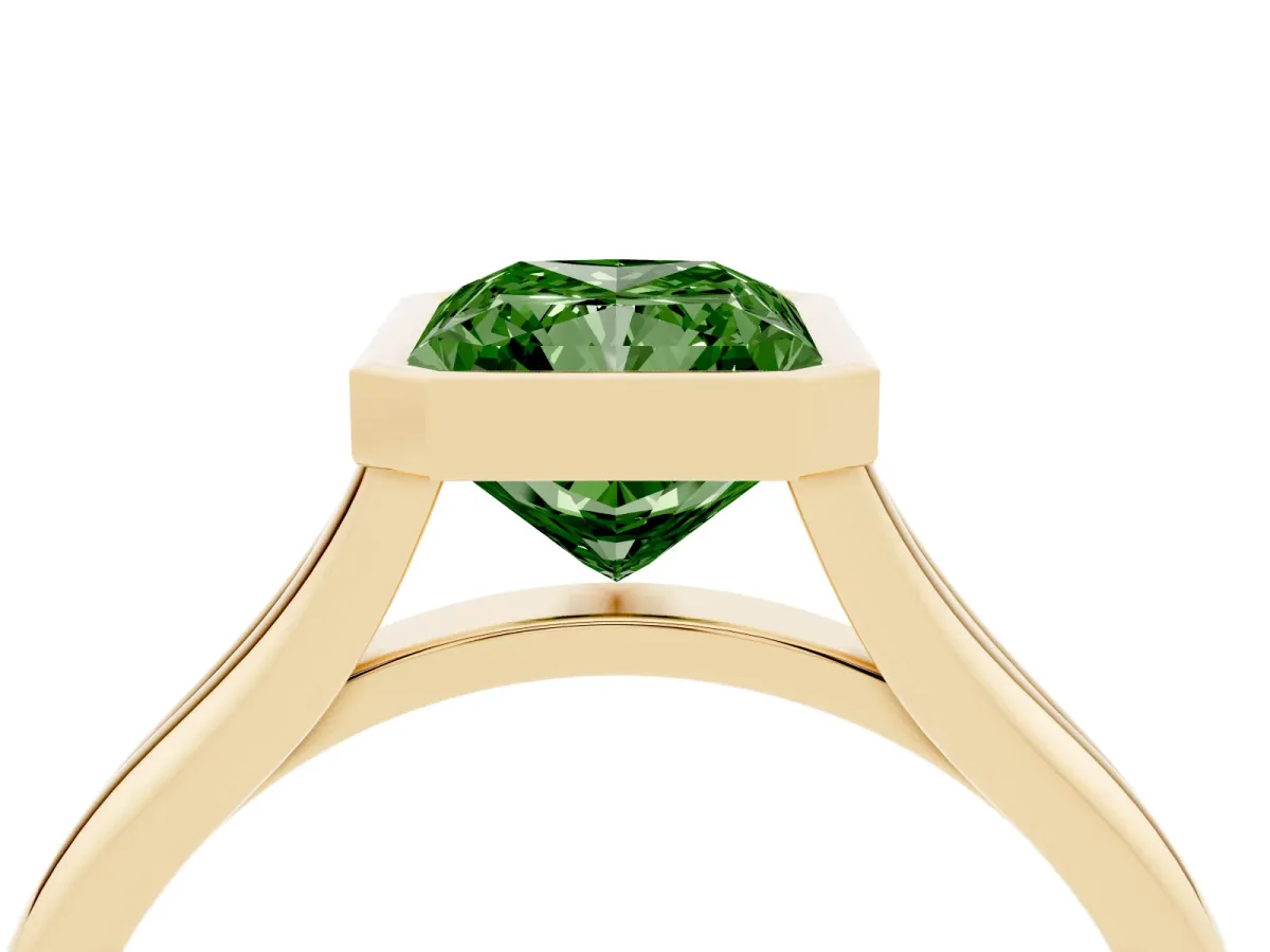 Fancy Green Bezel Set Radiant Cut Cut Solitaire Ring with Tapered Band Yellow gold