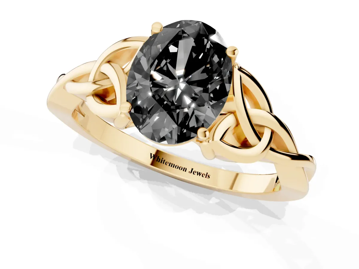 Fancy Black Oval Cut Diamond Solitaire Engagement Ring with Celtic Knot Band and Four-Prong Setting Yellow gold