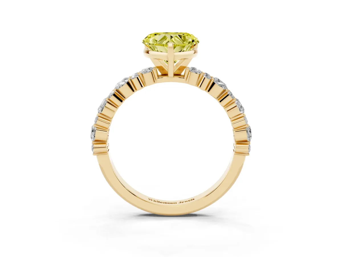 Fancy Yellow Heart Cut Diamond Side Stone Solitaire Ring with Round and Four-Prong Setting Yellow gold