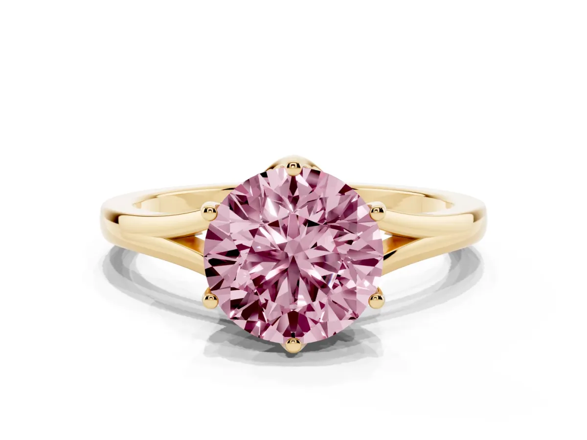 Fancy Pink Round Cut Solitaire Diamond Ring with Six-Prong Setting and Tapered Band Yellow gold