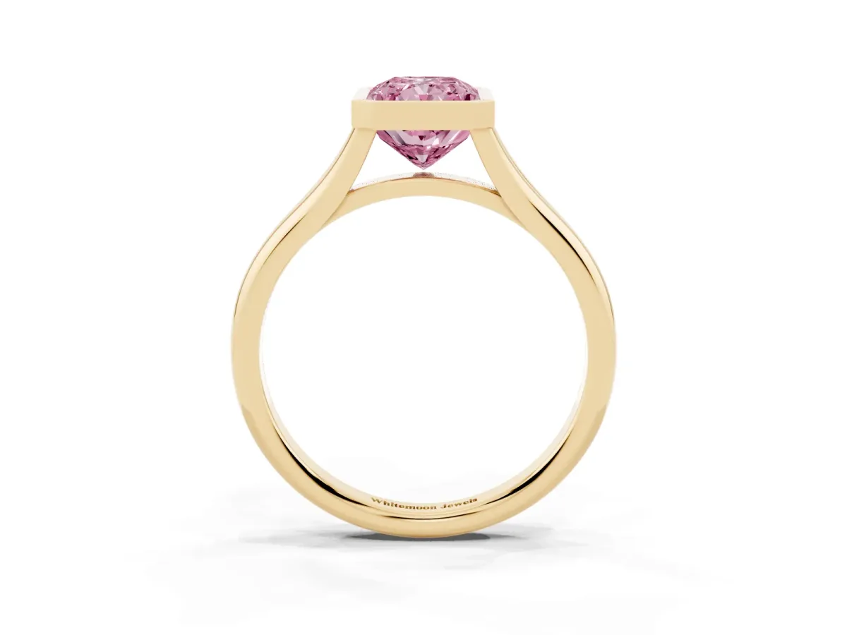 Fancy Pink Bezel Set Radiant Cut Cut Solitaire Ring with Tapered Band Yellow gold