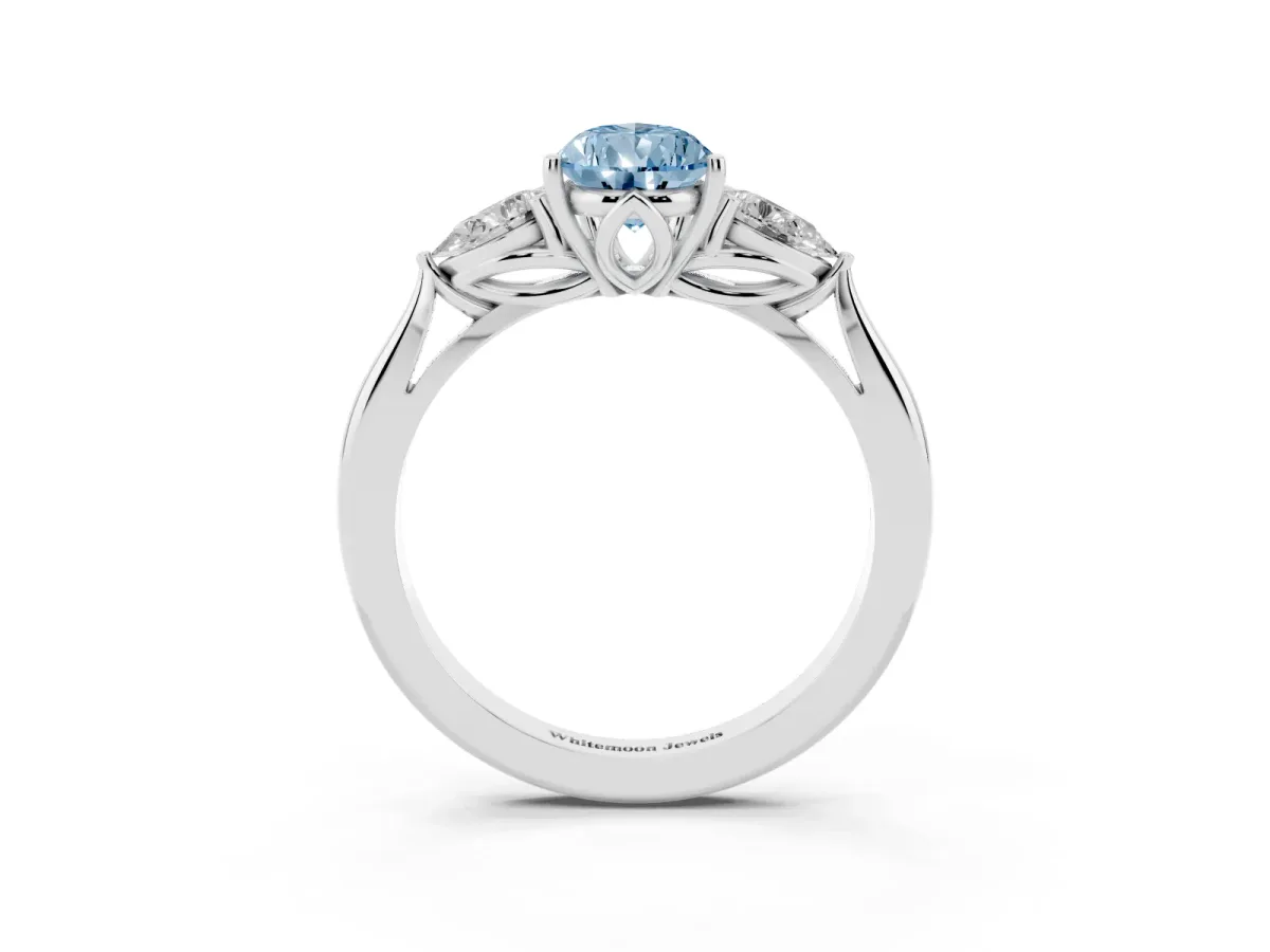 Fancy Blue Pear Cut Diamond Three-Stone Ring with Pear Side Stones and Prong Setting Platinum