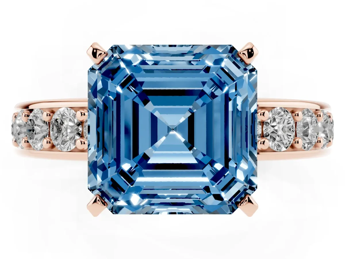Fancy Blue Asscher Cut Diamond Engagement Ring with Channel Set Round Band and Prong Setting Rose gold