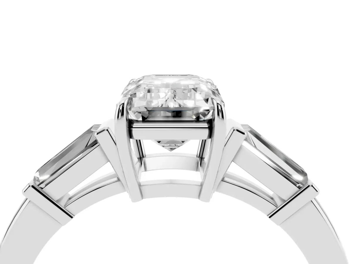 Emerald Cut Diamond Three-Stone Ring with Tapered Baguette Side Stones and Prong Setting White gold