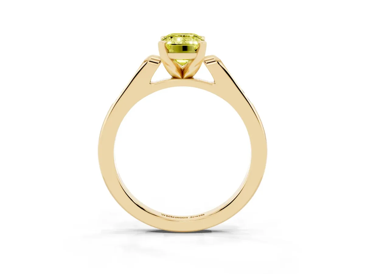 Fancy Yellow Emerald Cut Diamond Solitaire Ring with Channel Set Round Band and Prong Setting Yellow gold