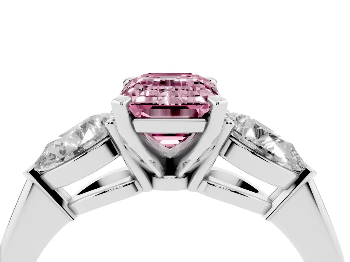 Fancy Pink Three-Stone Emerald Cut Diamond Ring with Pear Side Stones and Four-Prong Setting Silver