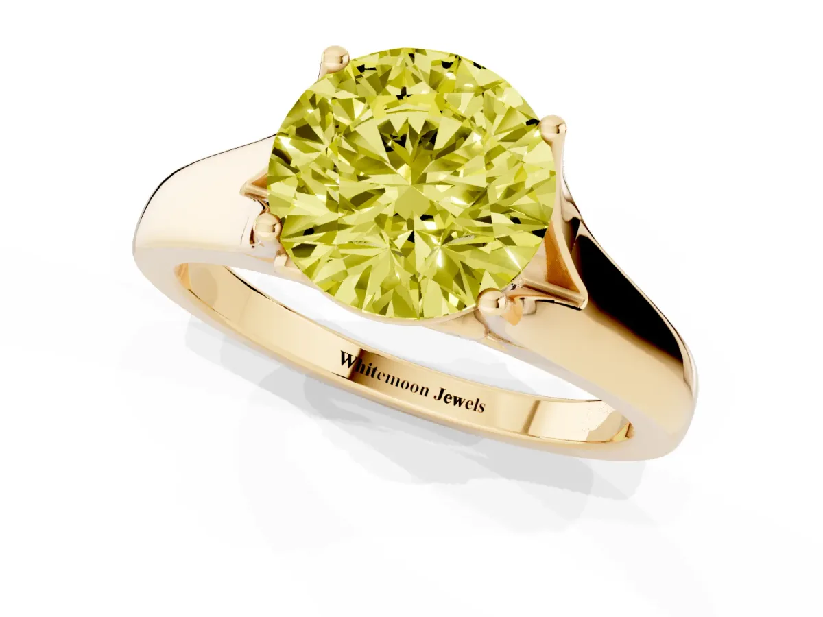 Fancy Yellow Round Cut Solitaire Diamond Ring with Cathedral Band and Four-Prong Setting Yellow gold