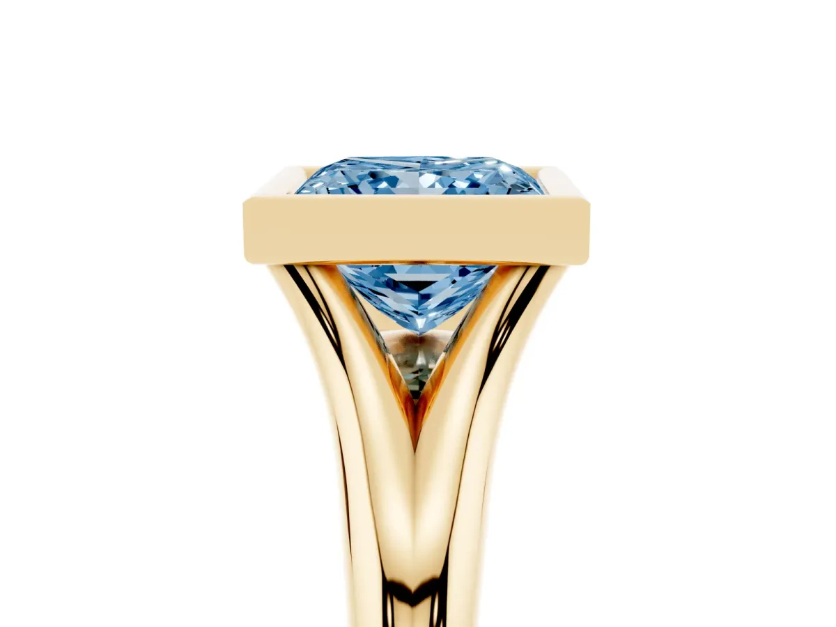 Fancy Blue Bezel Set Princess Cut Solitaire Diamond Ring with Smooth Band Yellow gold