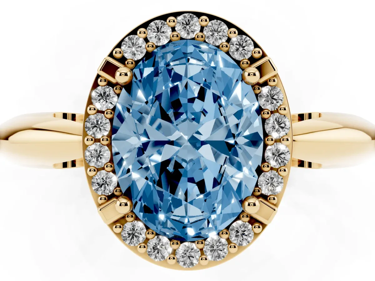 Fancy Blue Oval Cut Cut Diamond Halo Engagement Ring with Split Shank and Four-Prong Setting Yellow gold