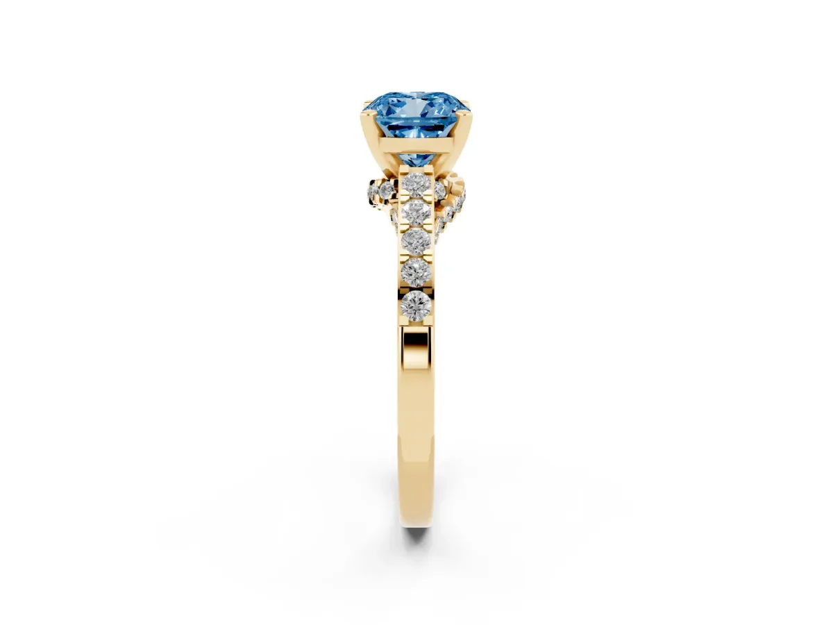 Fancy Blue Cushion Cut Diamond Solitaire Ring with Crossover Gallery and Round Pavé Band Yellow gold
