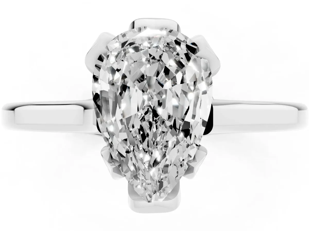Pear Cut Diamond Solitaire Ring with Flower Prong Setting and Classic Band Silver