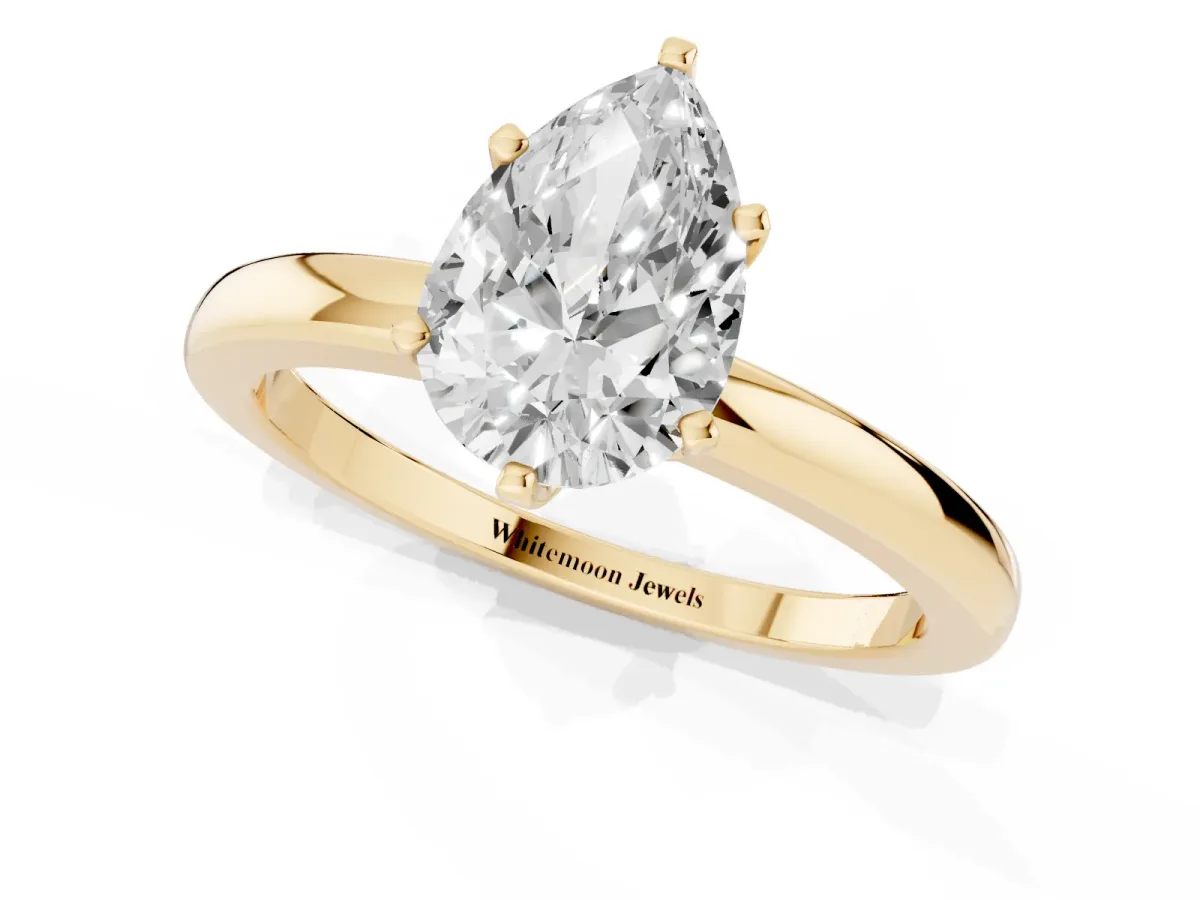 Pear Cut Solitaire Diamond Ring with Six-Prong Setting on a Classic Band Yellow gold