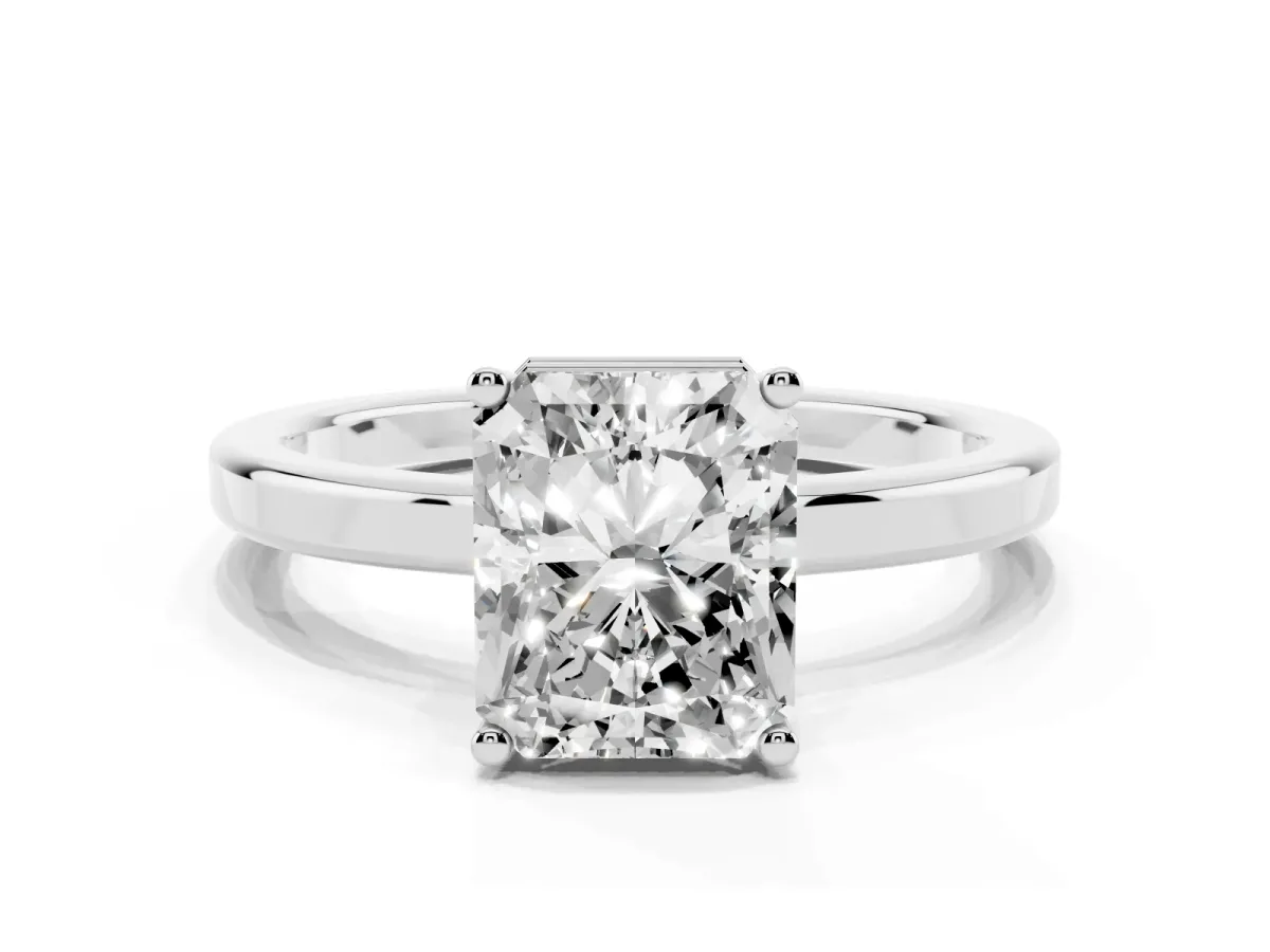 Radiant Cut Cut Solitaire Engagement Ring with Four-Prong Setting on a Classic Band Silver