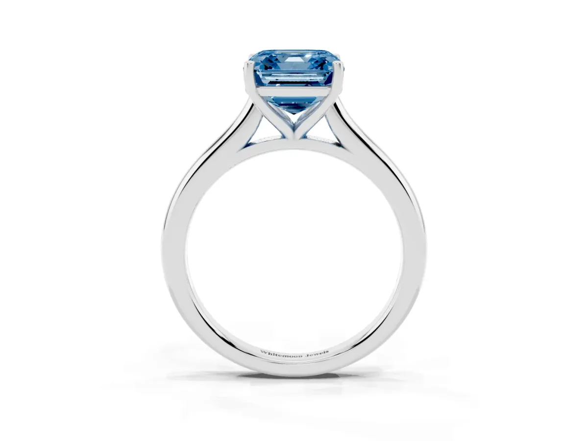 Fancy Blue Asscher Cut Cut Solitaire Ring with Cathedral Band and Four-Prong Setting Silver