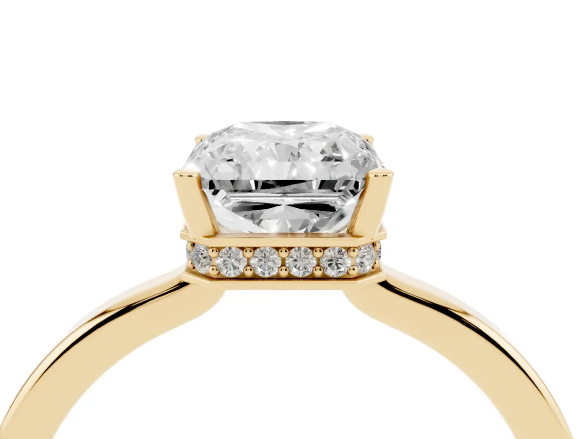 Radiant Cut Cut Solitaire Engagement Ring with Four-Prong Setting on a Classic Band Yellow gold