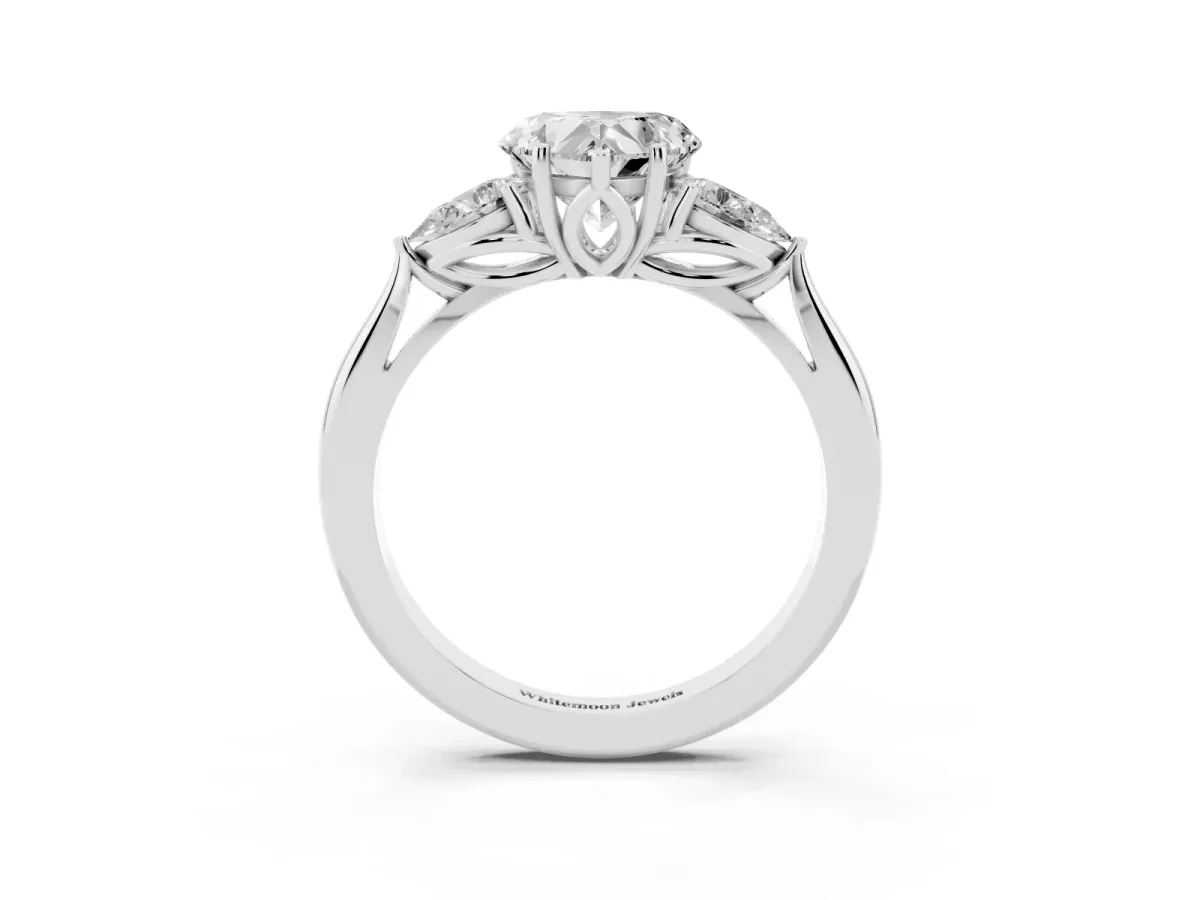 Heart Cut Diamond Three-Stone Ring with Pear Side Stones and Prong Setting Platinum