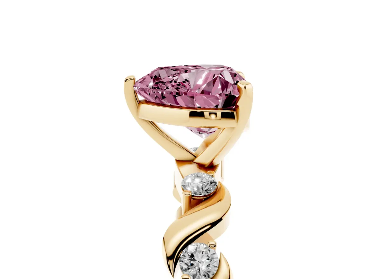 Fancy Pink Heart Cut Diamond Solitaire Twisted Band with Round Accents and Prong Setting Yellow gold