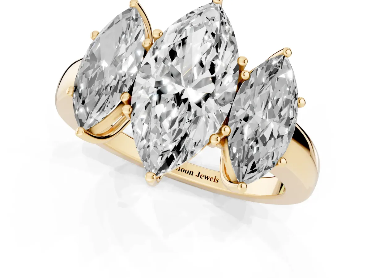 Marquise Cut Diamond Three-Stone Ring with Four-Prong Setting and Classic Band Yellow gold