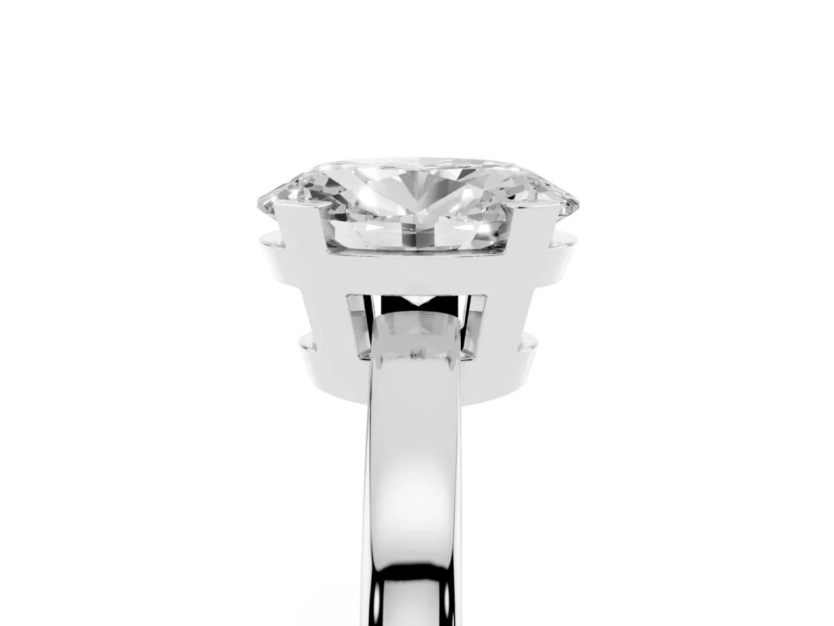 Oval Cut Cut Solitaire Ring with Four-Prong Setting and Classic Band Silver