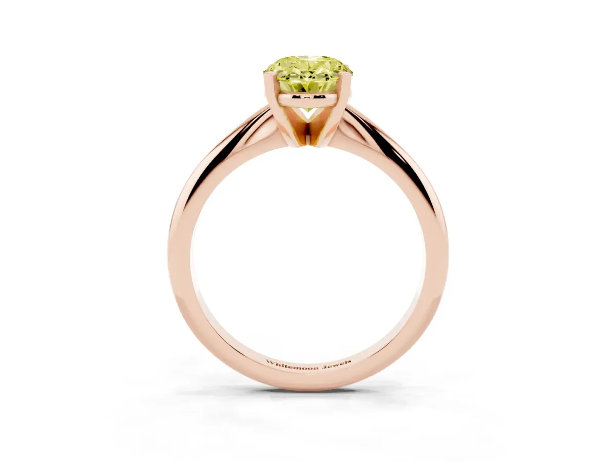 Fancy Yellow Oval Cut Cut Solitaire Ring with Four-Prong Setting on a Classic Band Rose gold