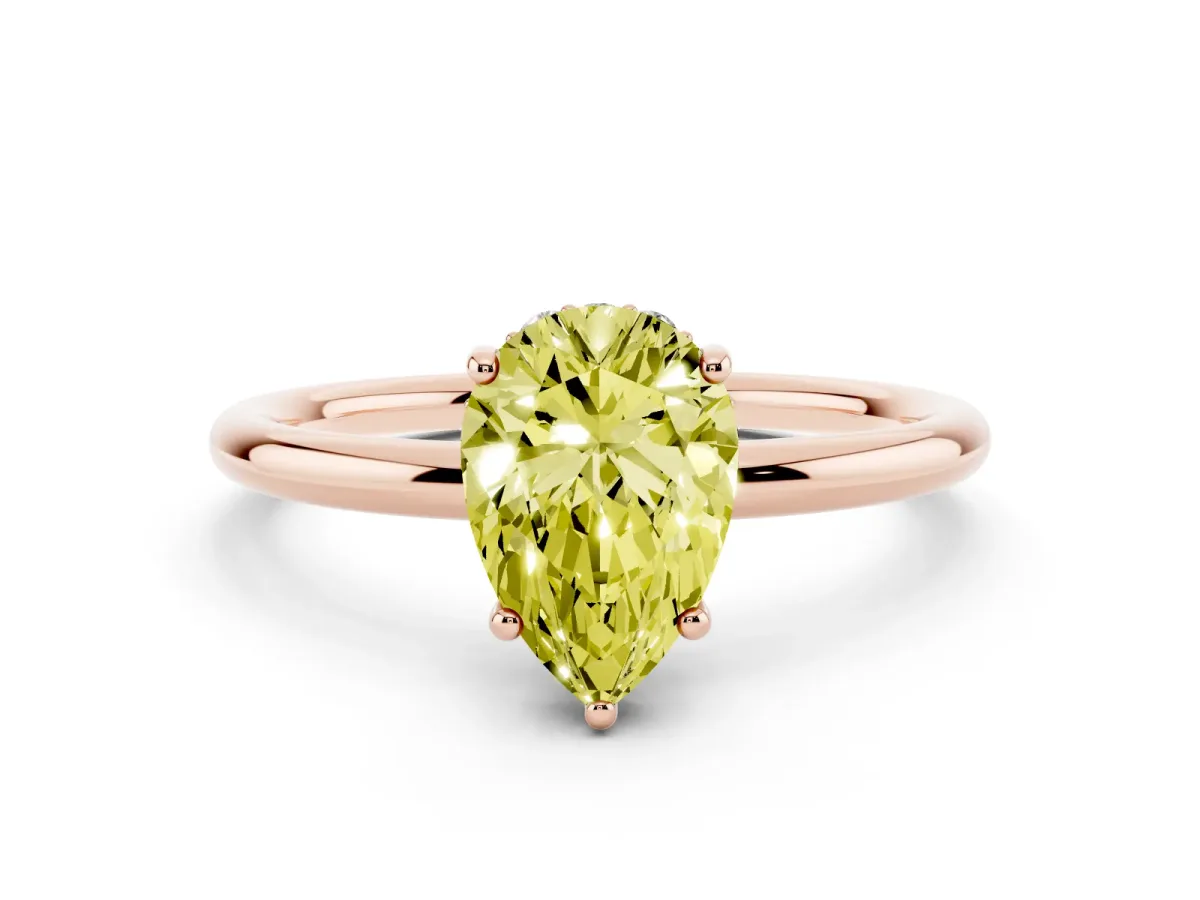 Fancy Yellow Pear Cut Solitaire Diamond Ring with a Classic Band and Four-Prong Setting Rose gold