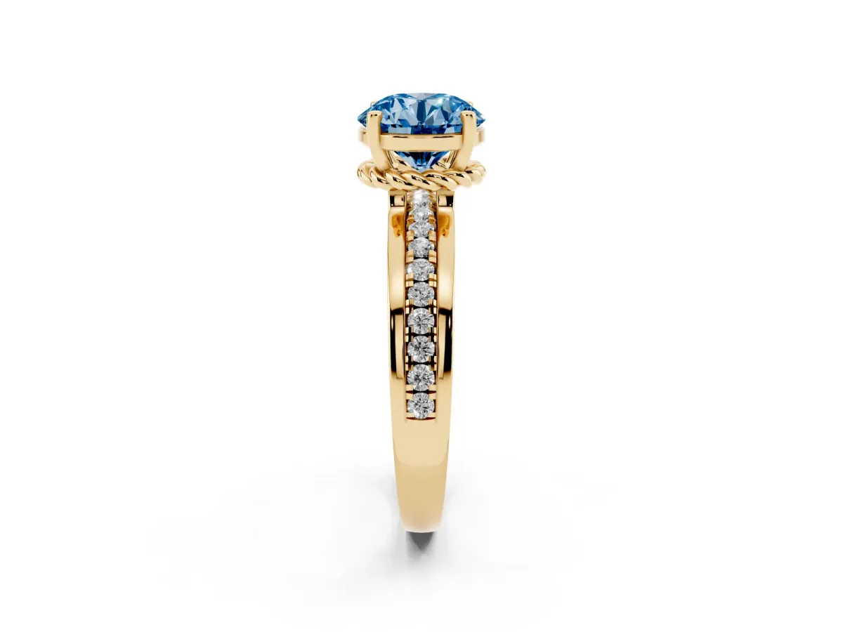 Fancy Blue Round Cut Solitaire Diamond Ring with Channel Set Band and Six-Prong Setting Yellow gold