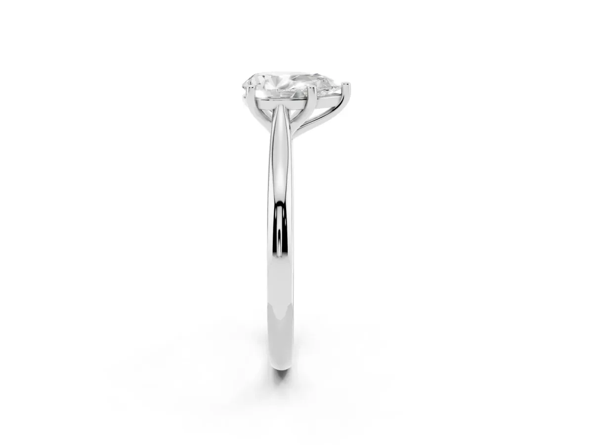 Pear Cut Cut Solitaire Ring with Cathedral Band and Four-Prong Setting Silver