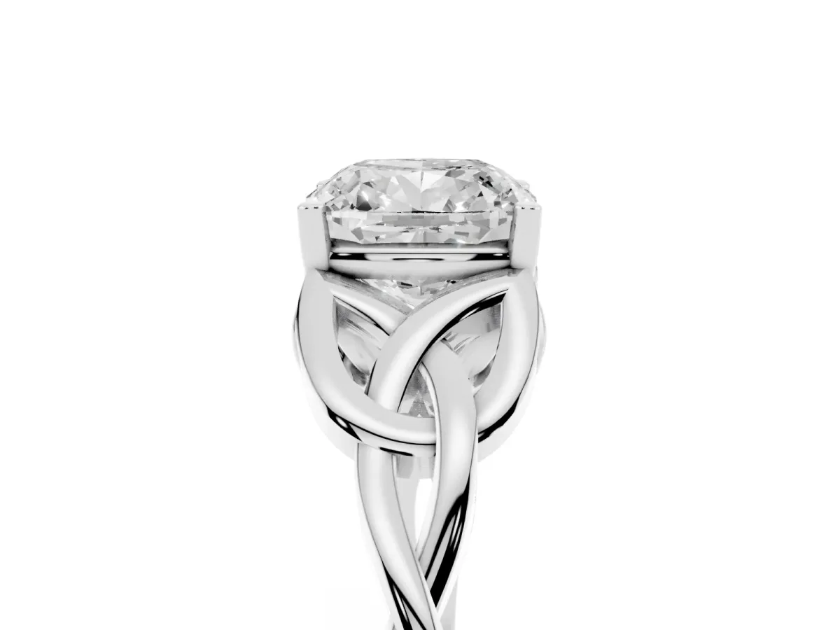 Cushion Cut Diamond Solitaire Engagement Ring with Celtic Knot Band and Four-Prong Setting Platinum