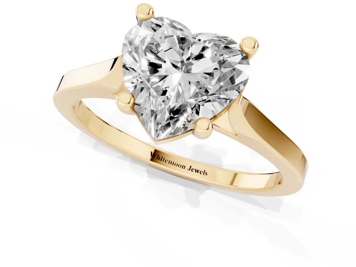 Heart Cut Solitaire Diamond Ring with Four-Prong Setting and Tapered Band Yellow gold