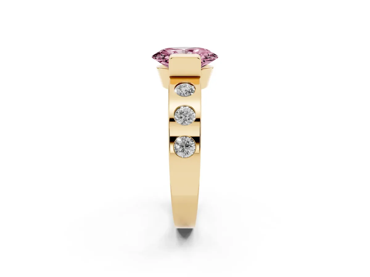 Fancy Pink Oval Cut Brilliant Channel-Set Diamond Ring with Bezel Prong Setting Yellow gold