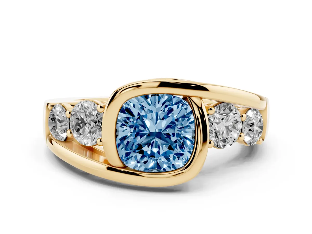 Fancy Blue Bezel Set Cushion Cut Diamond Bypass Ring with Round Accents Yellow gold