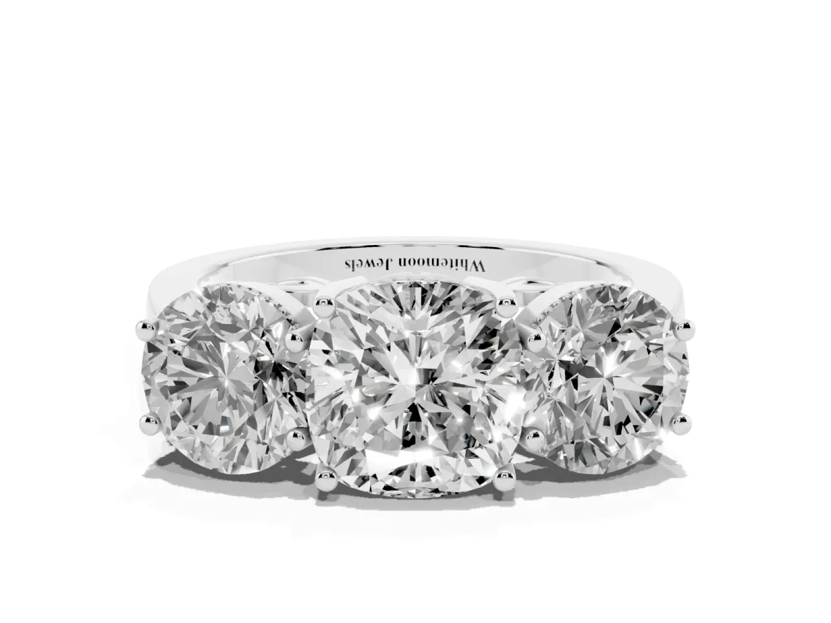 Three-Stone Cushion Cut Diamond Engagement Ring with Prong Setting on a Classic Band Silver
