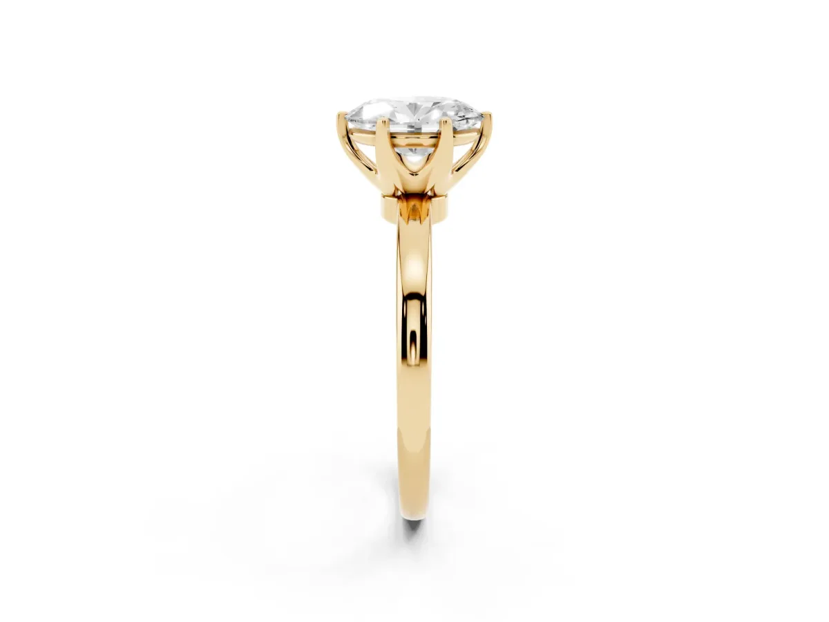 Oval Cut Solitaire Diamond Ring with Six-Prong Setting on a Classic Band Yellow gold