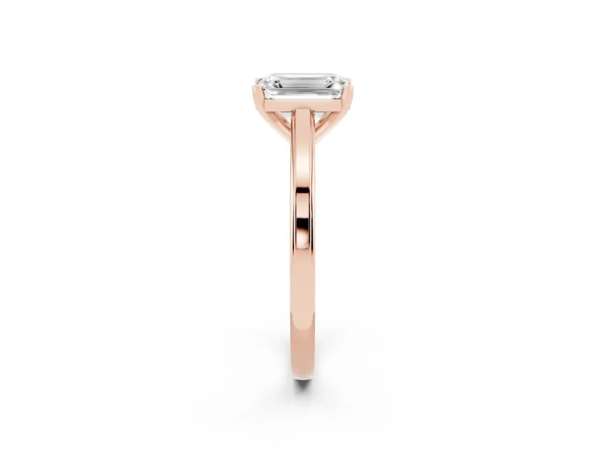 Emerald Cut Solitaire Diamond Ring with Four-Prong Setting and Classic Band Rose gold