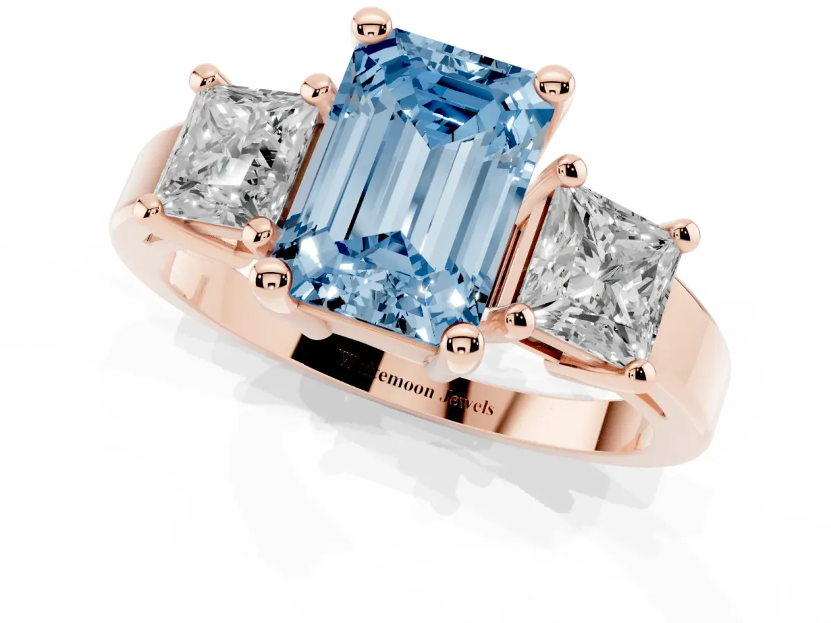 Fancy Blue Three-Stone Emerald Cut Cut Solitaire Ring with Prong Setting Rose gold