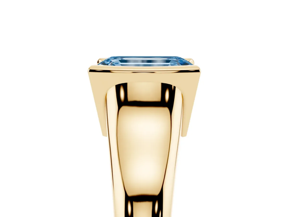 Fancy Blue Emerald Cut Solitaire Tension Set Diamond Ring with Split Shank Band Yellow gold