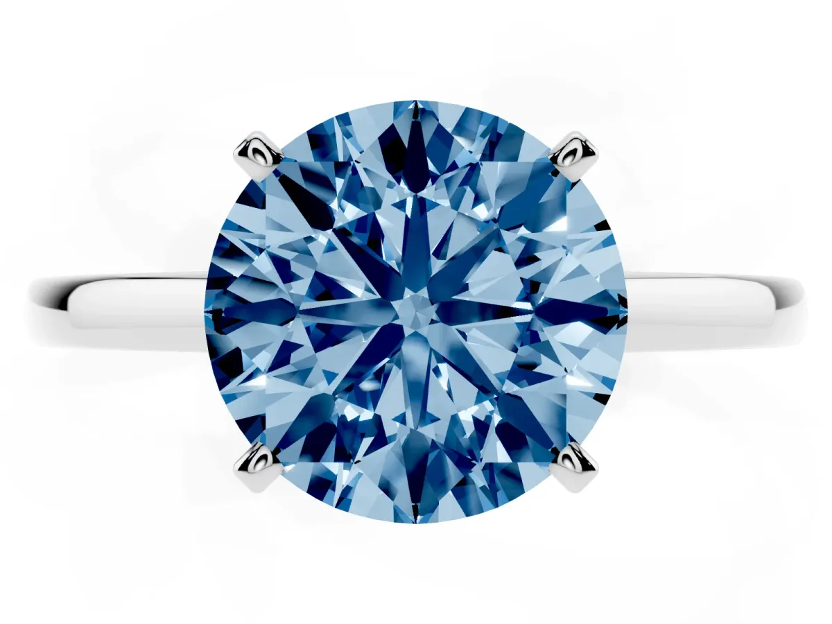 Fancy Blue Round Cut Solitaire Diamond Engagement Ring with Four-Prong Setting on a Classic Band Silver