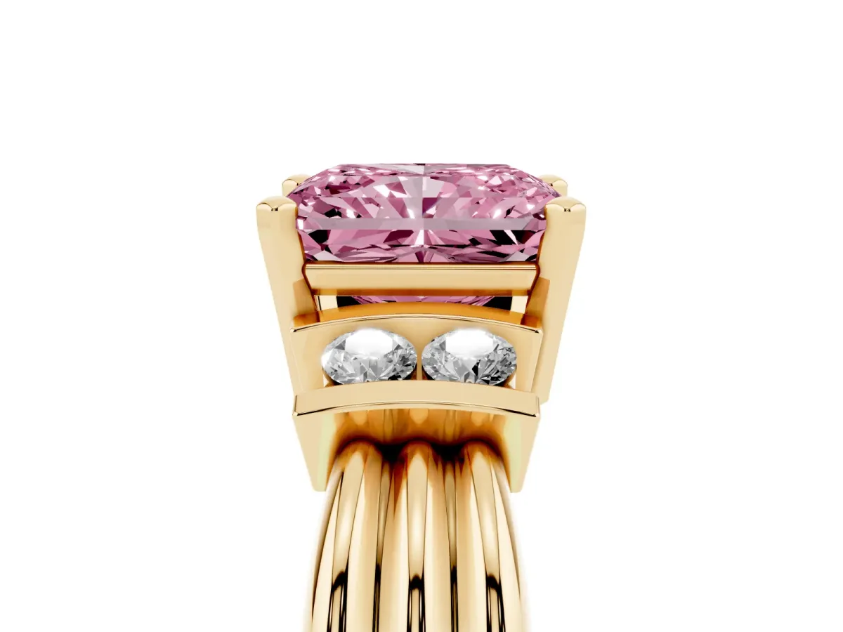 Fancy Pink Radiant Cut Cut Three-Stone Channel Set Ring with Bar Prongs Yellow gold