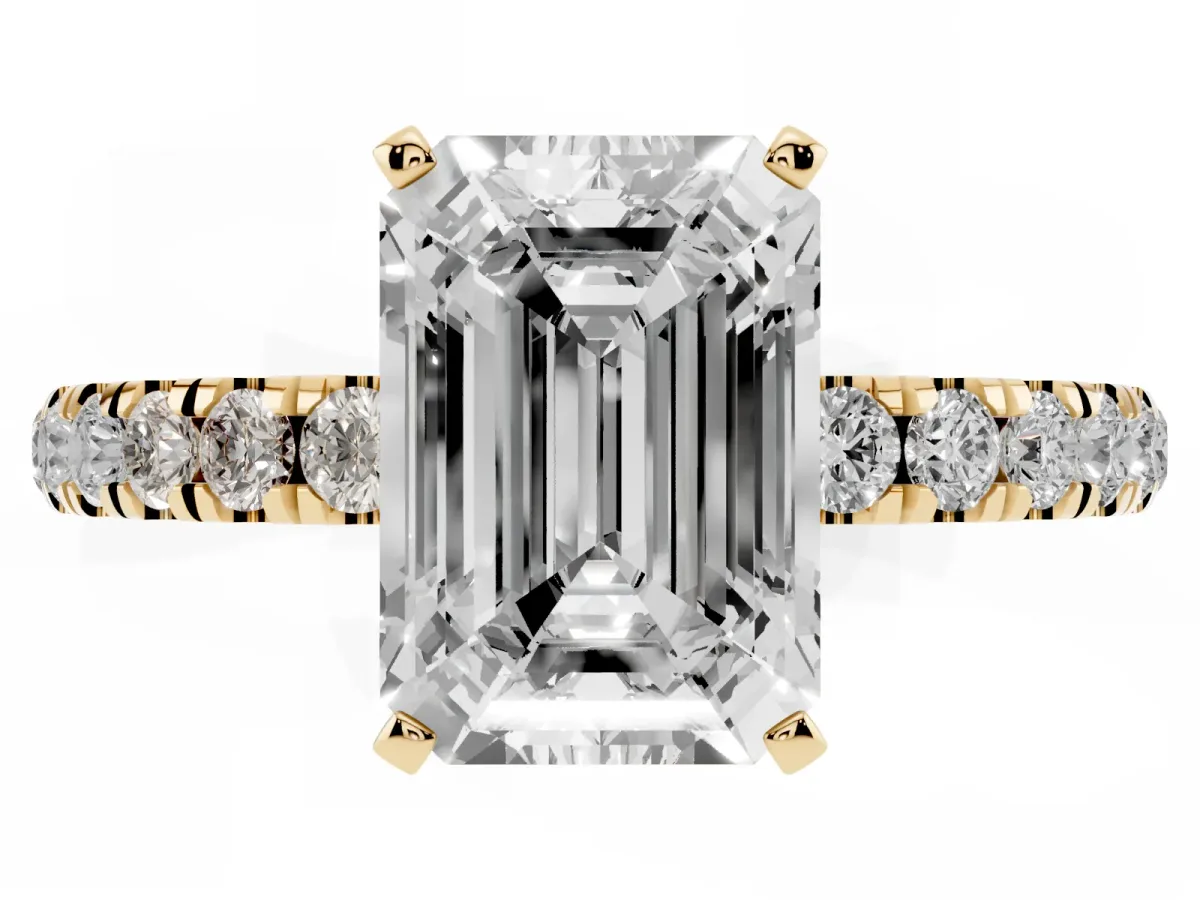 Emerald Cut Diamond Solitaire Ring with Pavé Accents and Four-Prong Setting Yellow gold