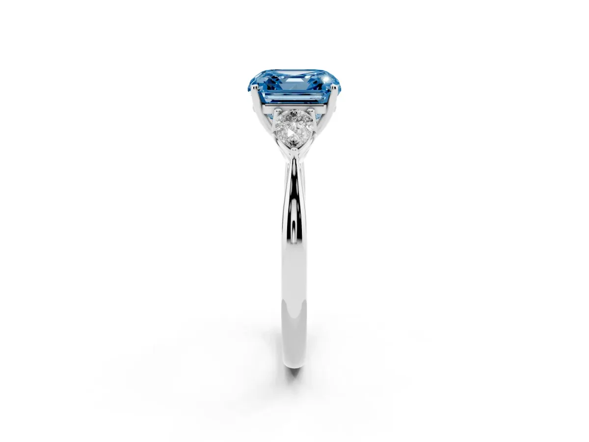 Fancy Blue Three-Stone Asscher Cut Brilliant Diamond Solitaire Ring with Tapered Band and Four-Prong Setting Platinum