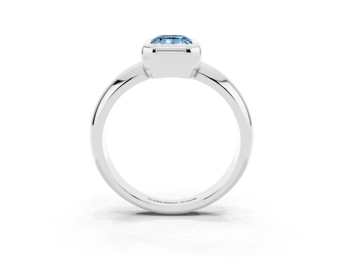 Fancy Blue Bezel Set Emerald Cut Solitaire Ring with Wide Band Platinum