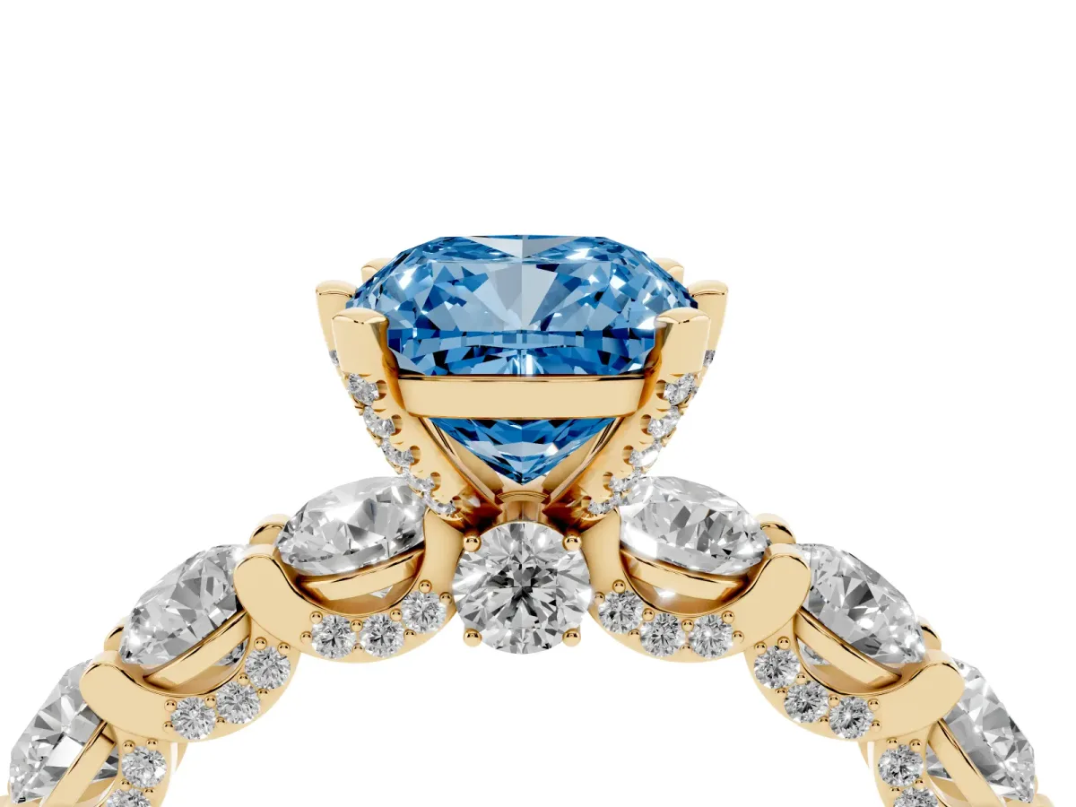 Fancy Blue Cushion Cut Diamond Side Stone Engagement Ring with Four-Prong Setting Yellow gold
