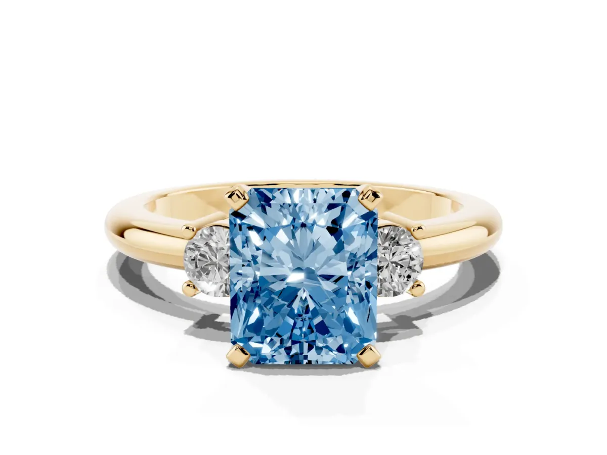 Fancy Blue Three-Stone Radiant Cut Cut Diamond Solitaire with Prong Setting and Classic Band Yellow gold